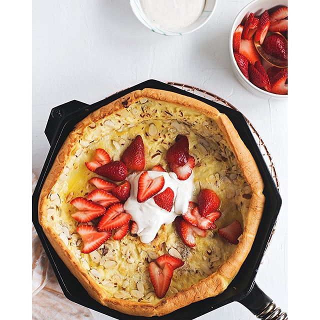 Dutch Baby With Almonds, Strawberries And Vanilla Bean Creme Fraiche by