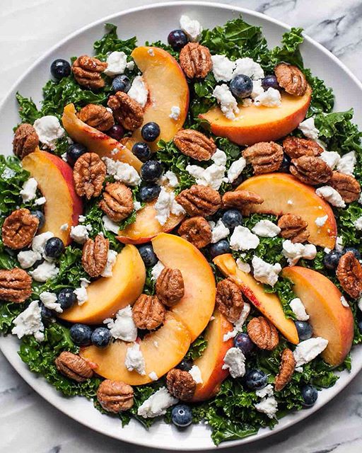 Summer Kale Salad With Peaches, Blueberries, Goat Cheese And Candied