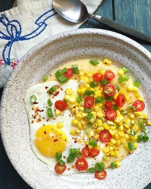 Cheddar Cheese Grits With A Sunny Side Up Egg, Cherry Tomatoes And