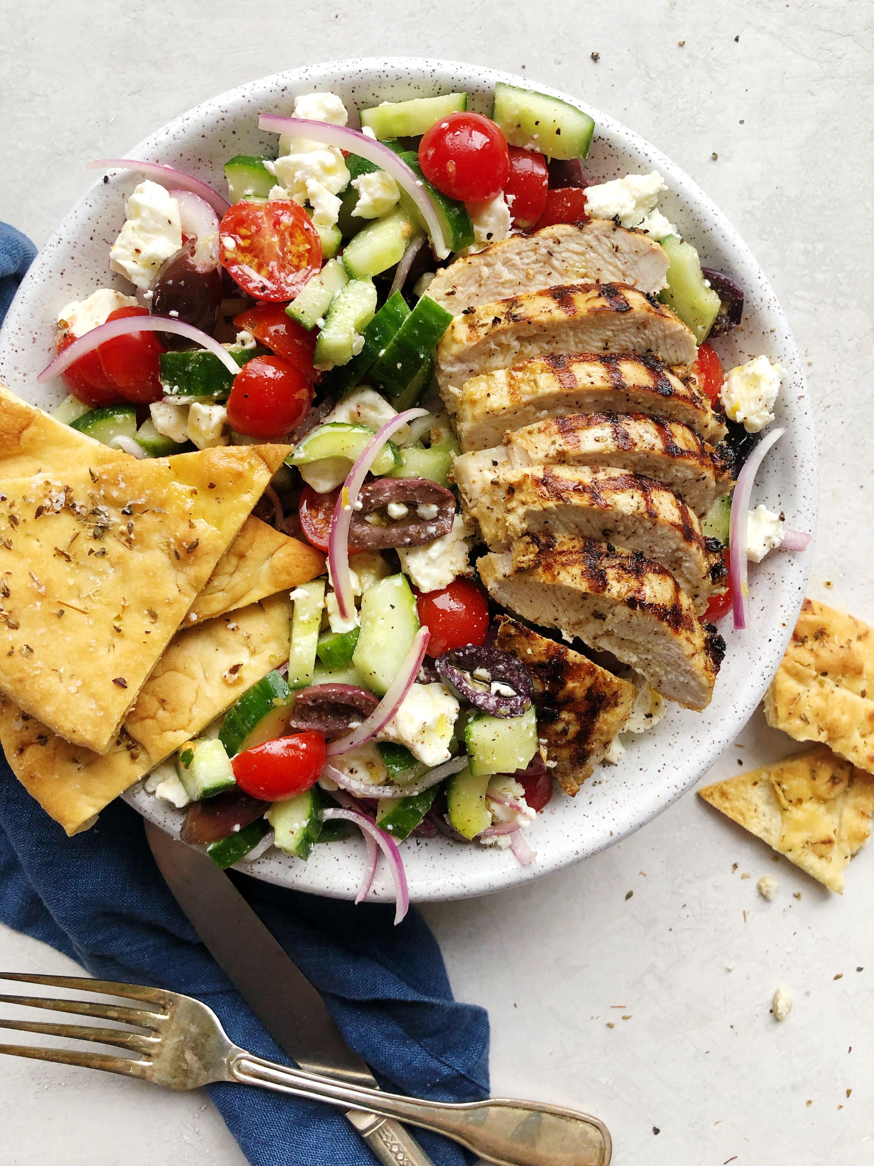 Greek Salad with Grilled Chicken and Baked Pita Wedges by thefeedfeed