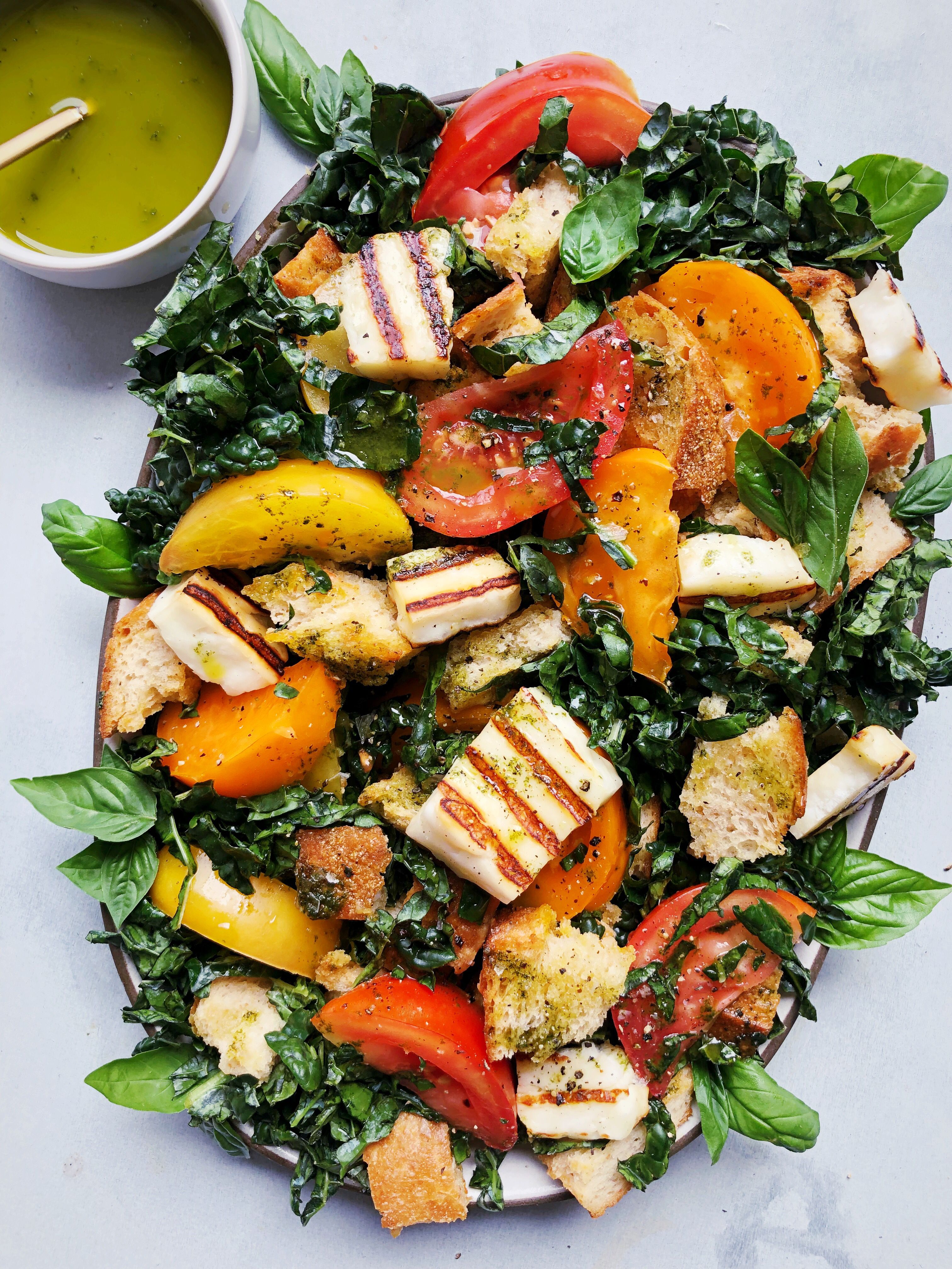 Heirloom Tomato and Grilled Halloumi Panzanella with Basil Oil Recipe