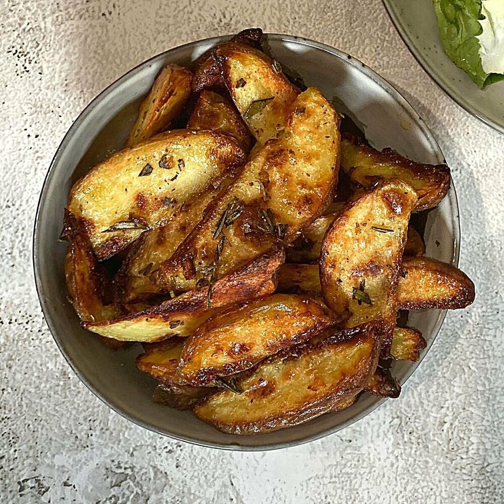 Yummy ItalianStyle Baked Seasoned Potato Wedges The Feedfeed