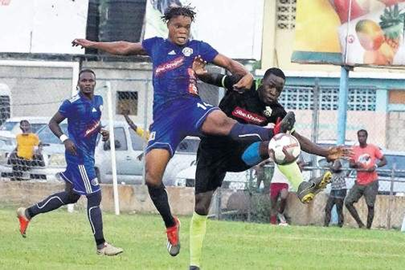 Mount Pleasant FA's Suelae McCalla (centre) and Fakibi