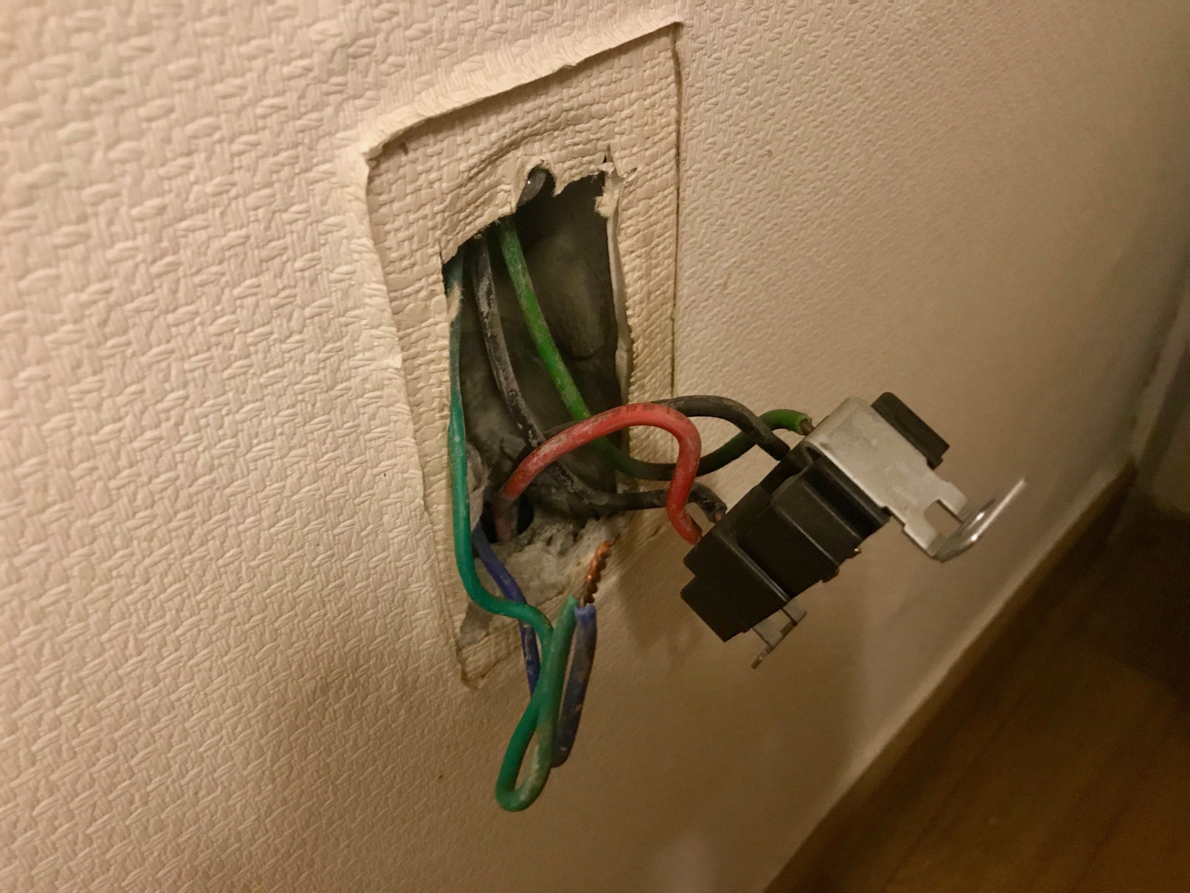 Installing a grounded wall socket