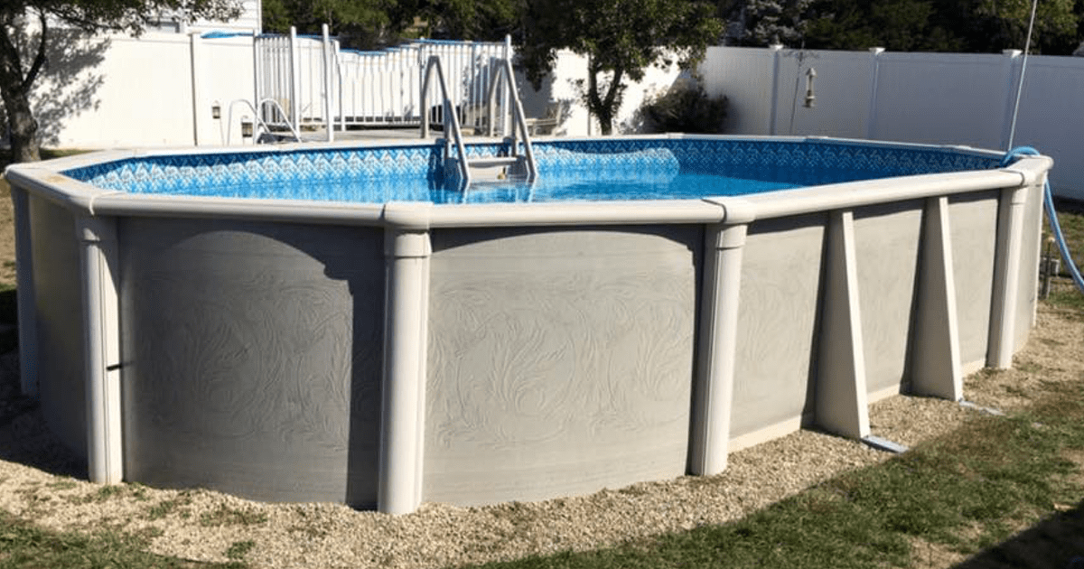 18'x33' Johnny Weissmuller slat wall oval with fence/deck/walk around standard bead liner