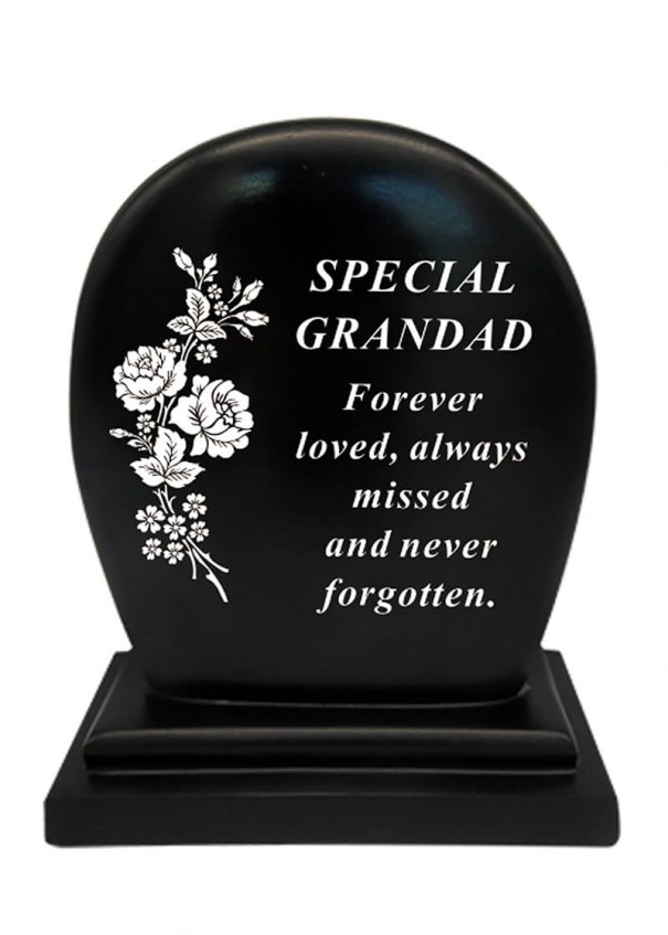Rounded black graveside plaque with flower detail