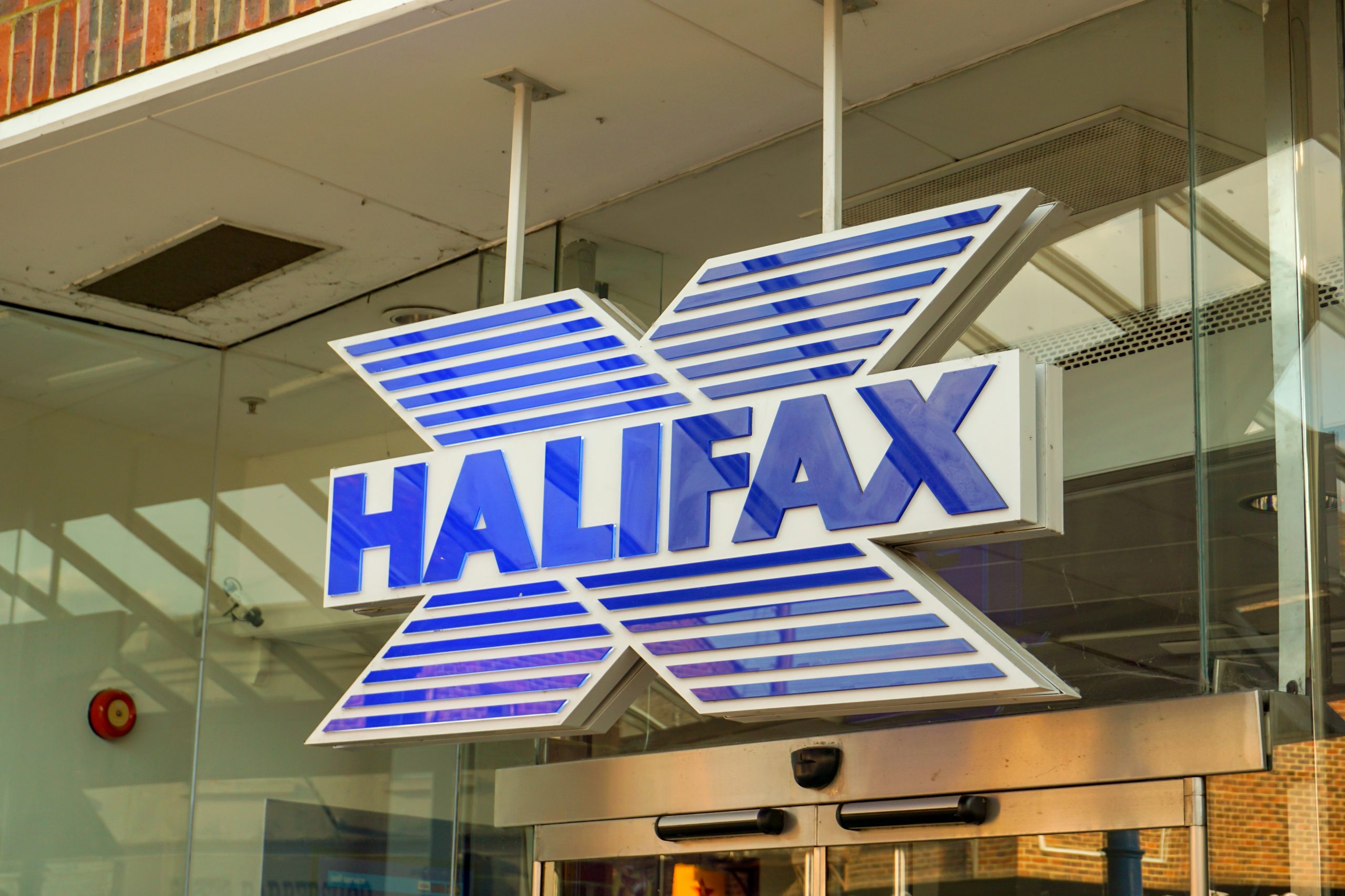 Halifax is slammed for introducing pronouns to staff name badges but