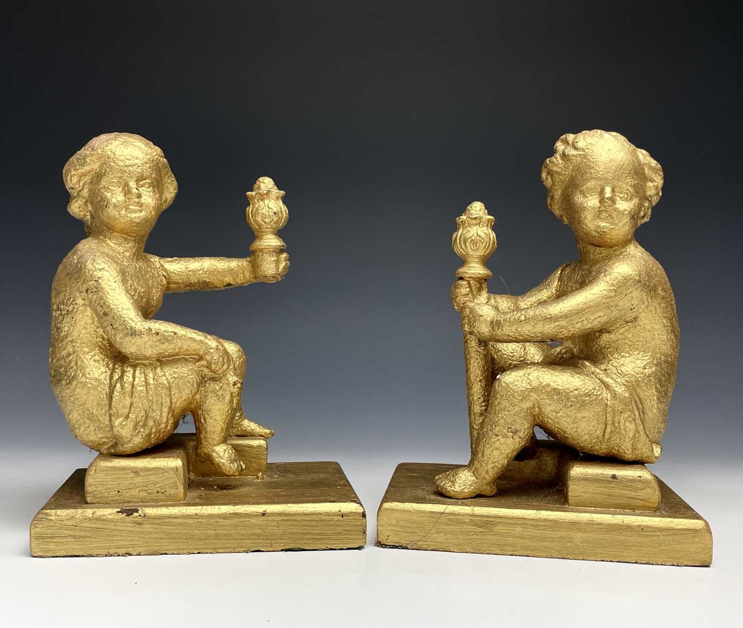 Lot 366 A pair of cast iron figures modelled as