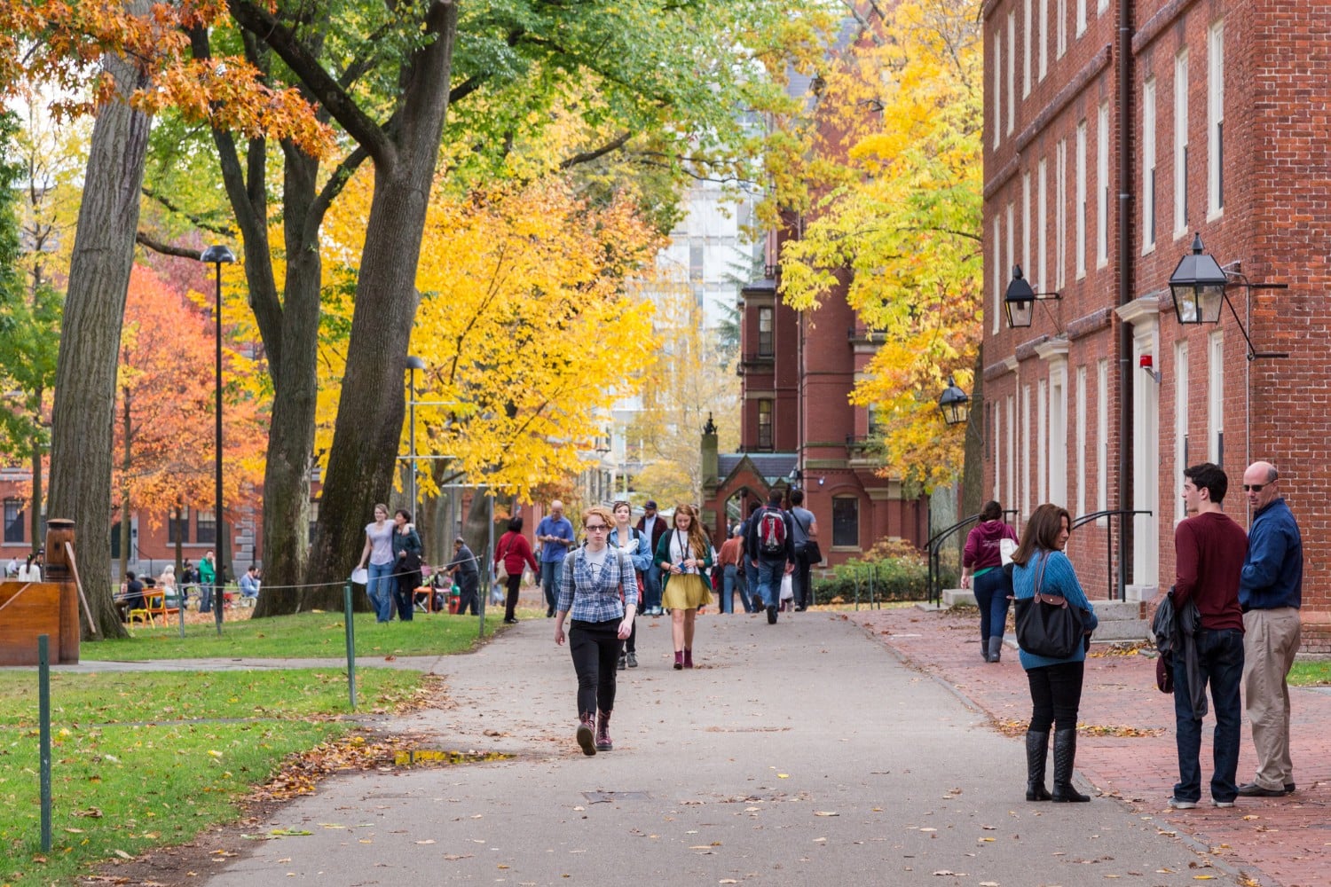 students walking around campus at davidson college Davidson Village Inn