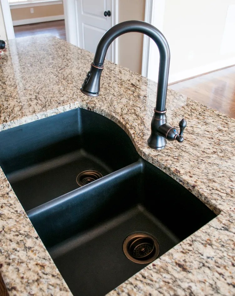 How to clean a black sink? Remove traces of soap, limescale and make it