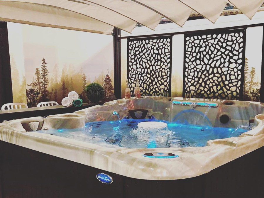Infinity Edge Hot Tub from Coast Spas at Decked Out Home Hearth and