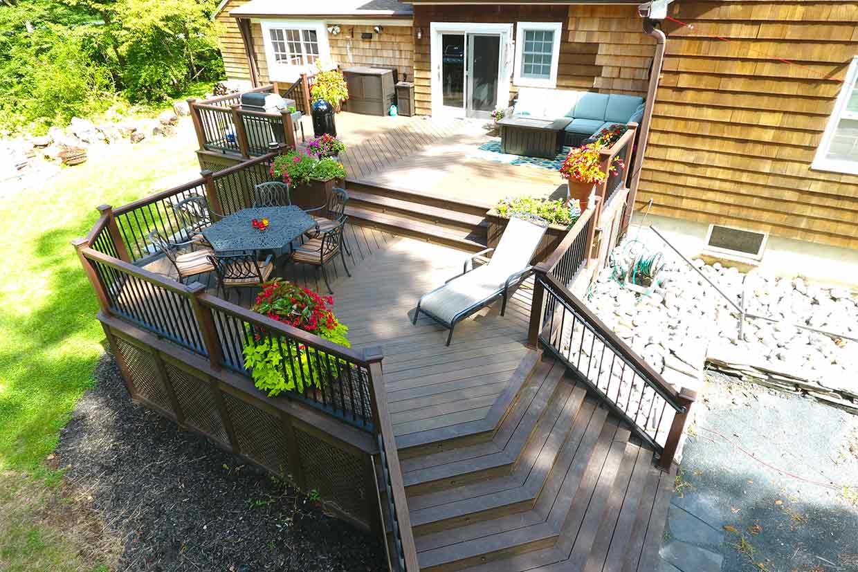 800 Sq. Ft. Multi Level Deck With Built In Planters And 2 Sides Steps.