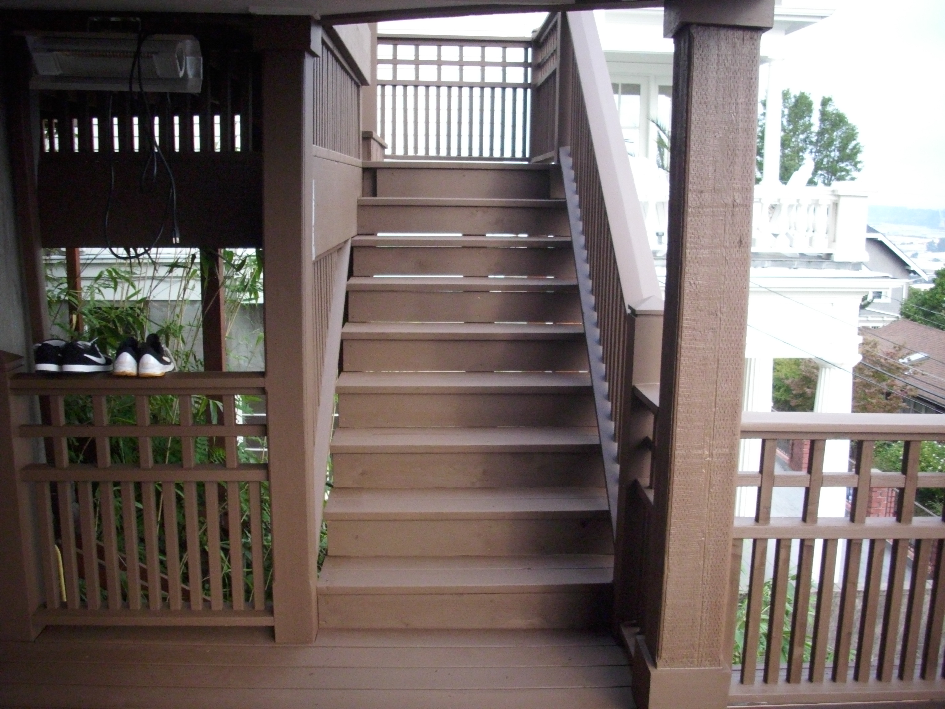 Stained cedar stairs Deck Masters, LLC
