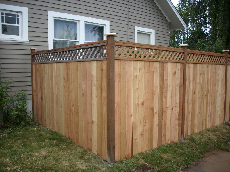 Lattice top cedar fence Deck Masters, LLC