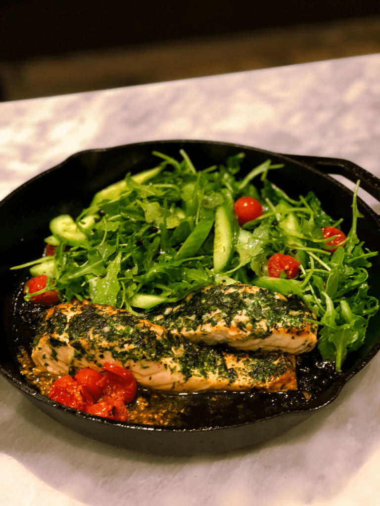 Cast Iron Herb Crusted Salmon Fillets with Baby Greens Delicious Dish