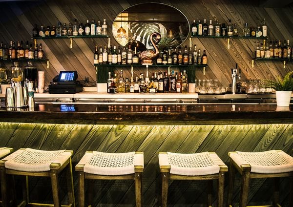 A NEW TROPICAL BAR SWINGS INTO THE MARINA Delta Millworks
