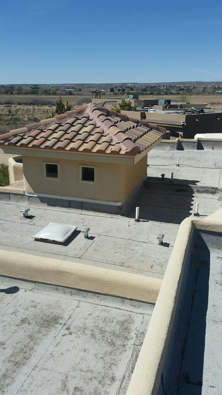 KM Roof Coating Denney Construction