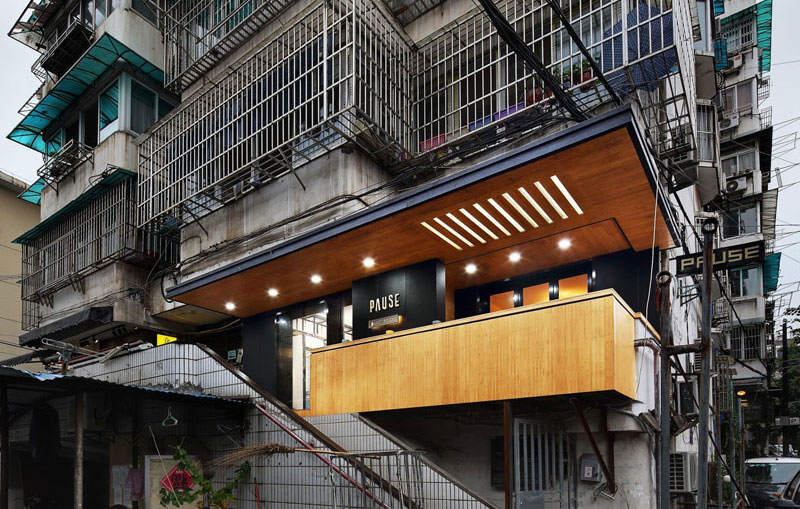 This Cozy Coffee Shop Was Inserted In An Apartment Block In