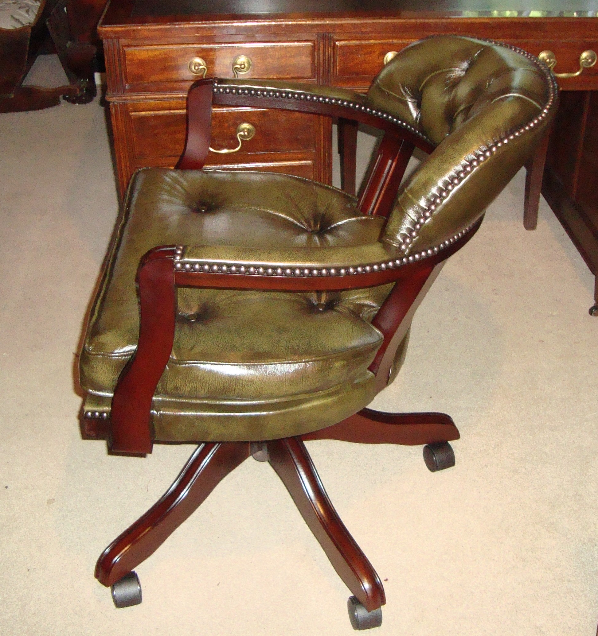 Reproduction, mahogany framed, leather upholstered desk chair Dorking