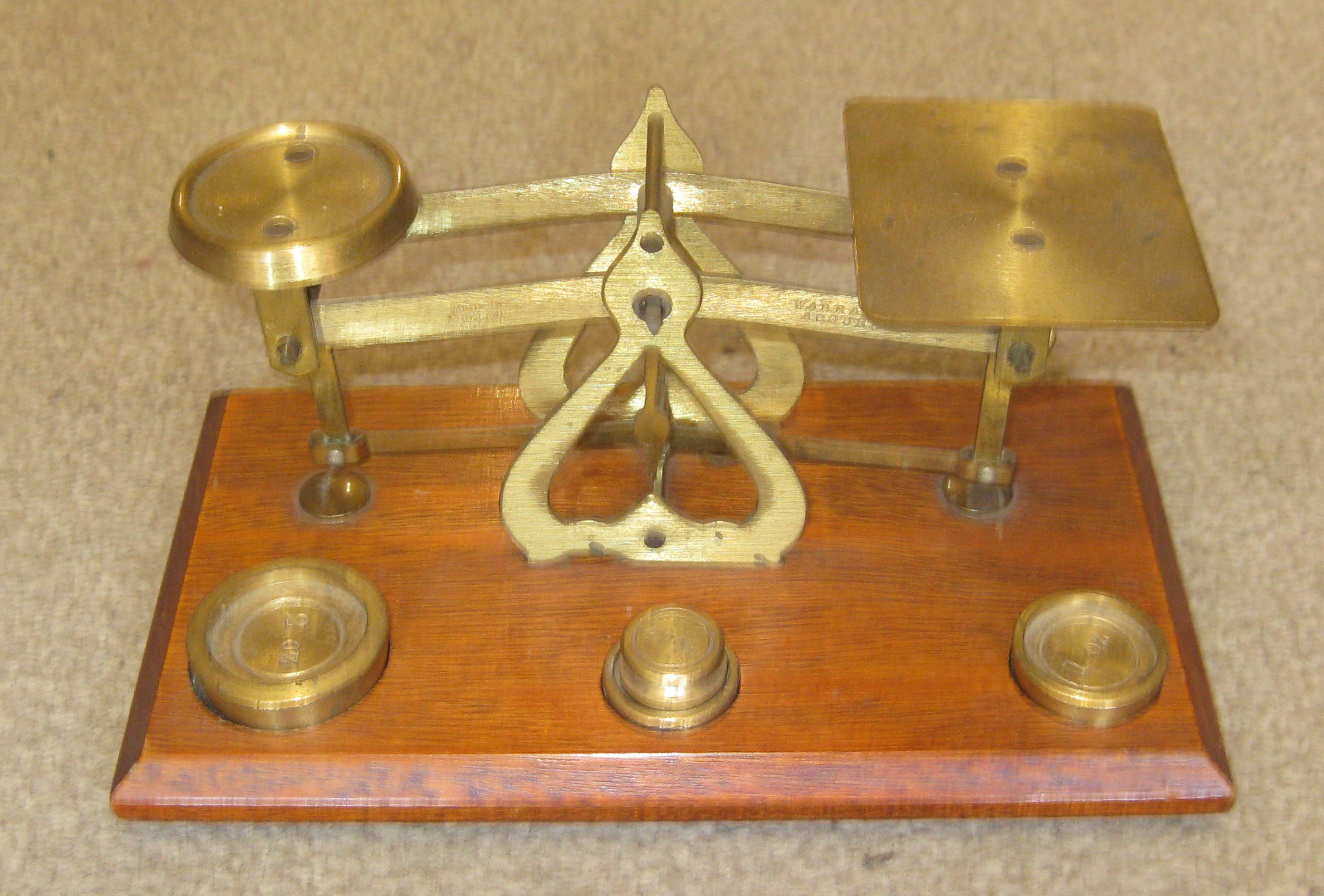 Antique set of brass postal scales on an oak base. Dorking Desks