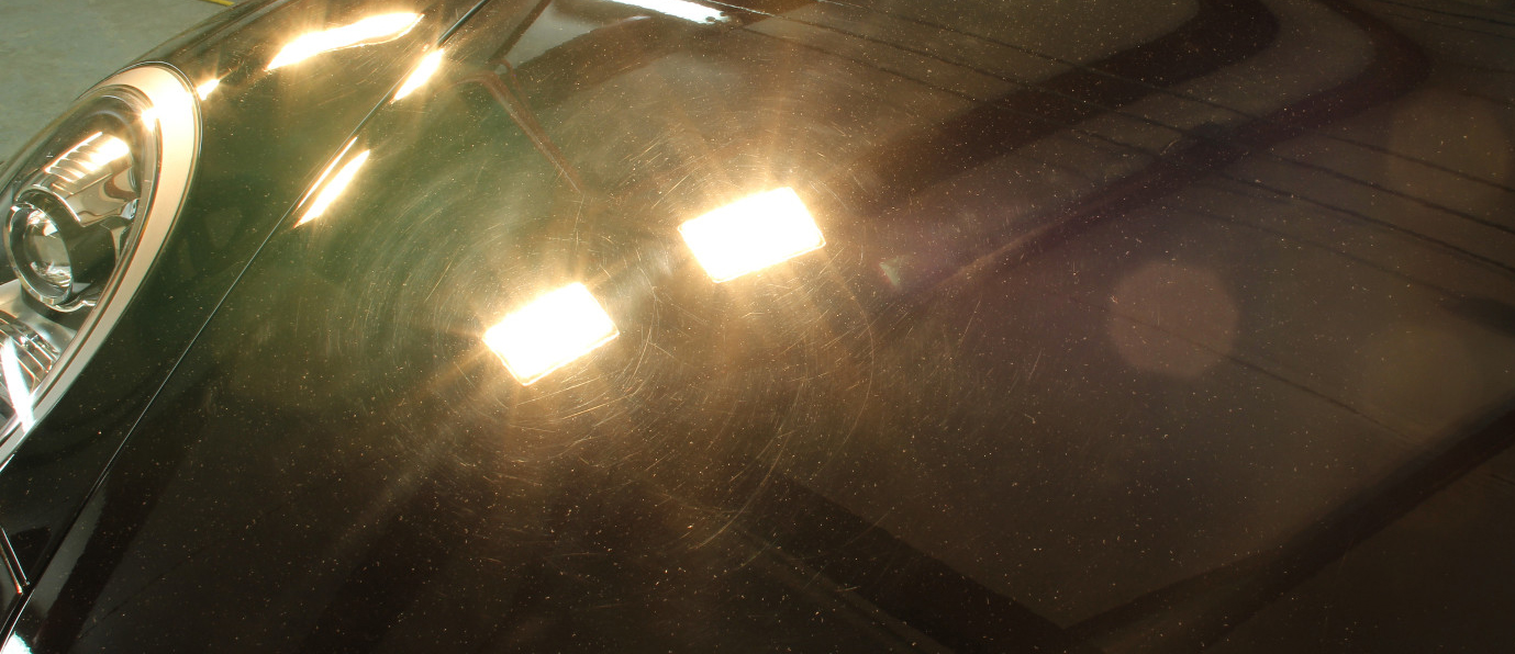 What causes swirl marks and other defects in modern car paint? The