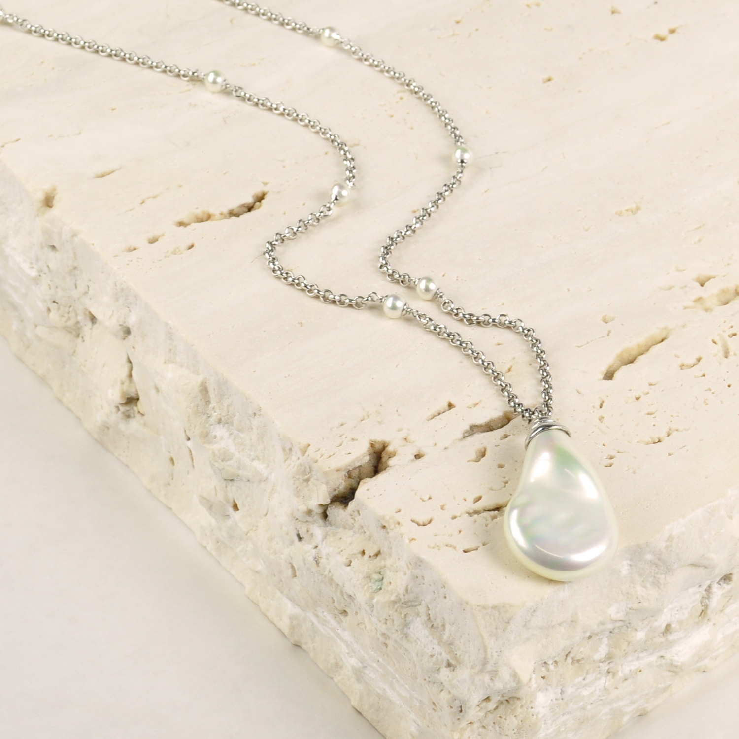 Teardrop shaped pendant on chain