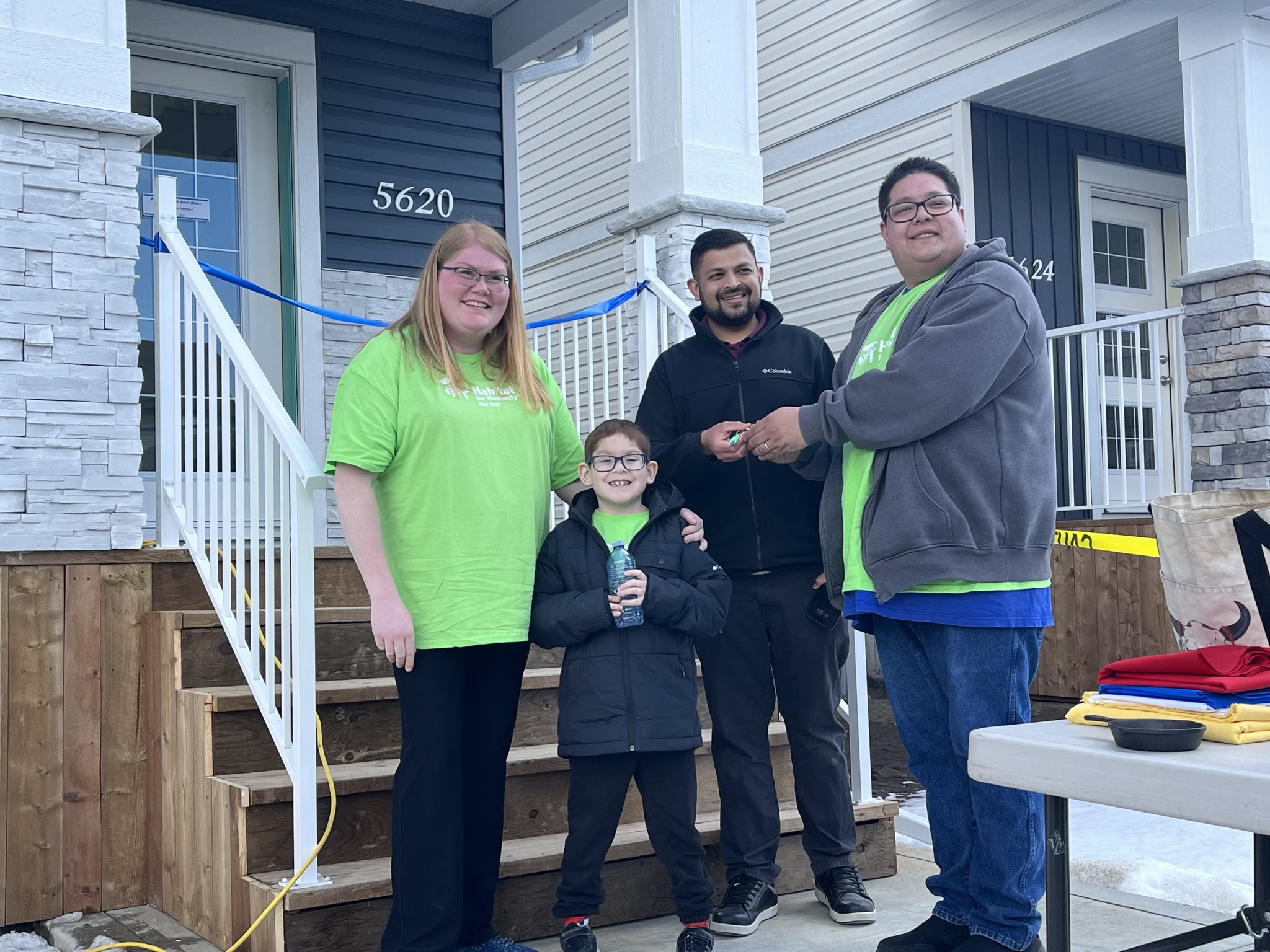 Habitat for Humanity Red Deer presents keys to four families at Home