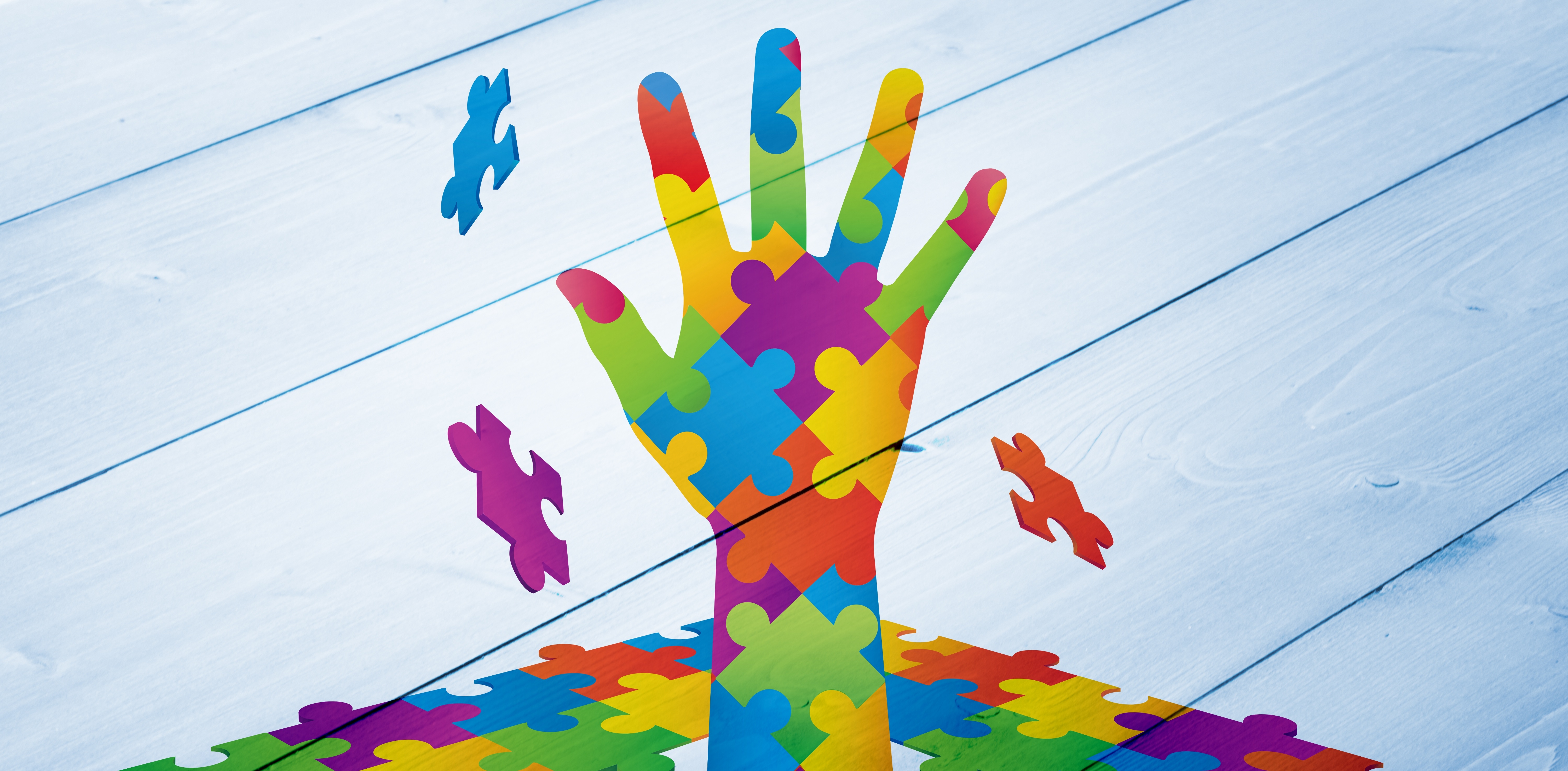 Composite image of autism awareness hand The Diamond Learning Trust