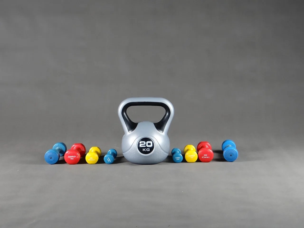 Dumbbells vs. Barbells A Guide to Strength Training