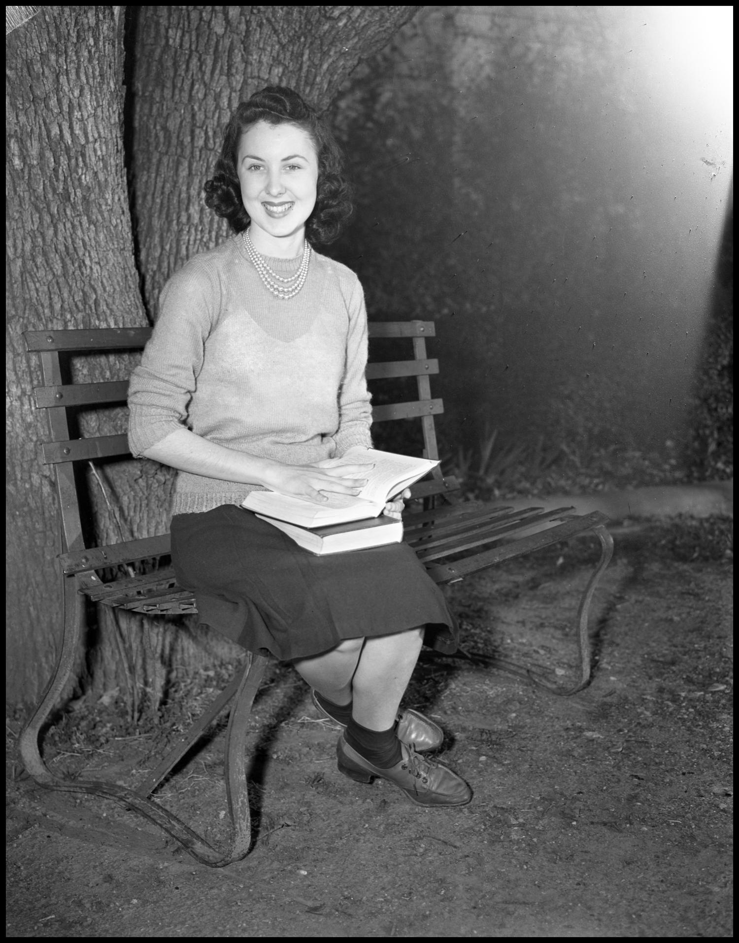 [Velma Rae Bateman sitting on a park bench] UNT Digital Library