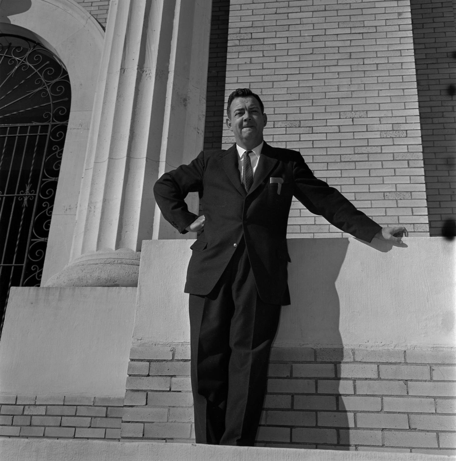 [Dr. Ernest Clifton standing in front of a building] UNT Digital Library