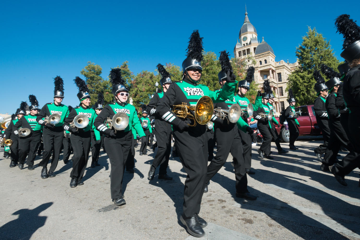 [North Texas marching band in front of the Denton courthouse, 2] UNT Digital Library