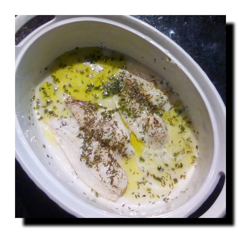 FLOUNDER FILLETS SEASONED WITH THYME CHIVES BLOOD ORANGE OLIVE OIL