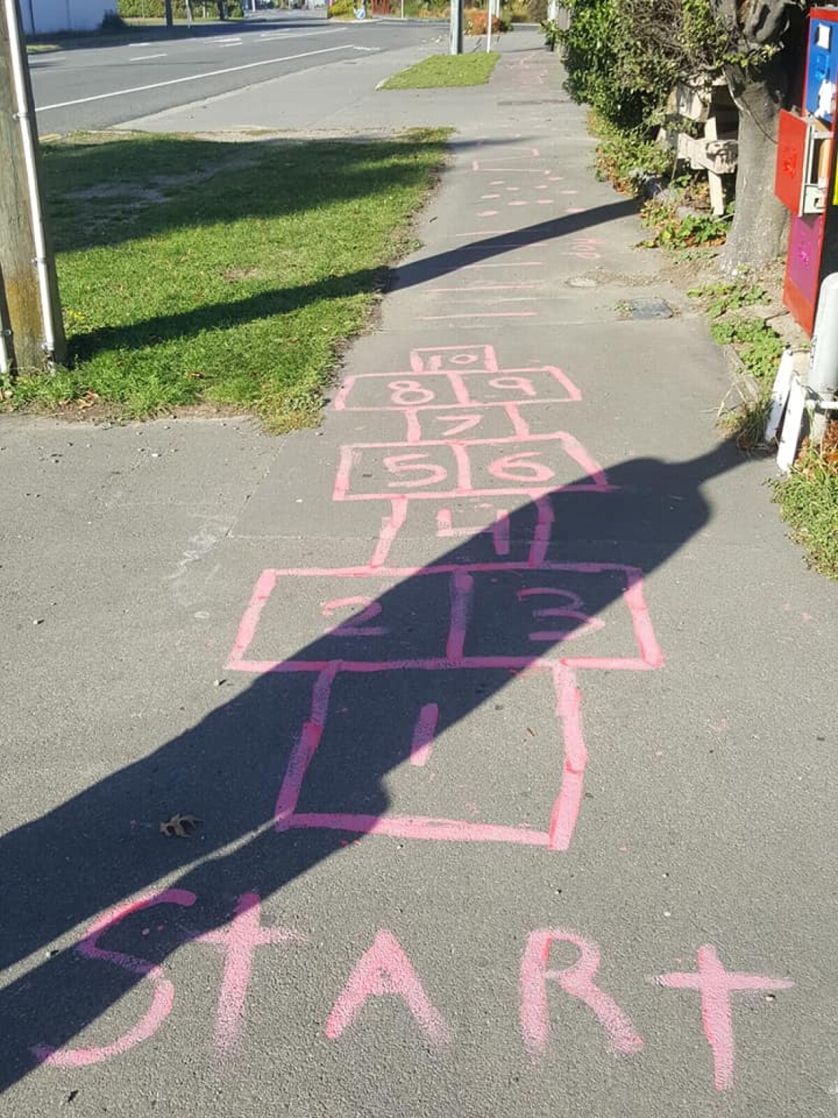 Hopscotch on the footpath discoverywall.nz