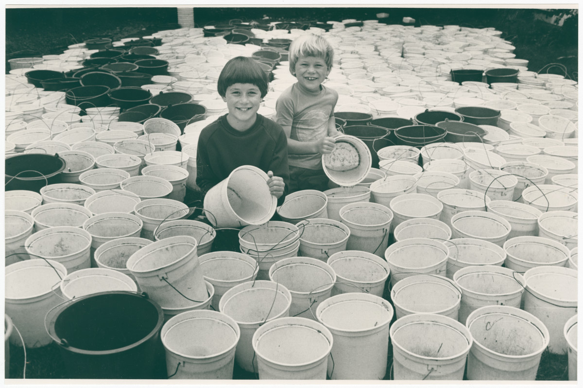 Ben and Thomas Harrow with fruit picking buckets discoverywall.nz
