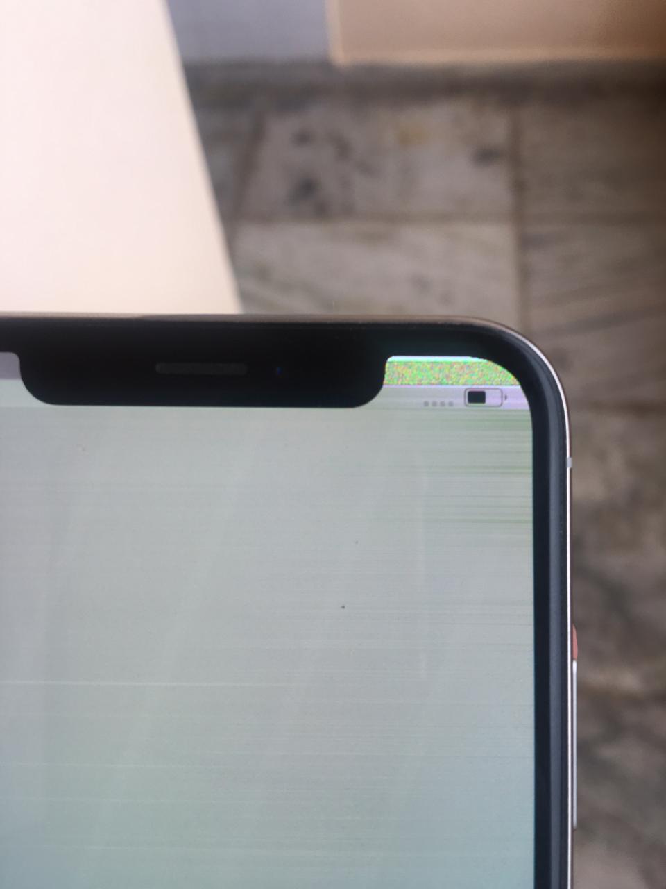 Getting green patch at top right corner, … Apple Community