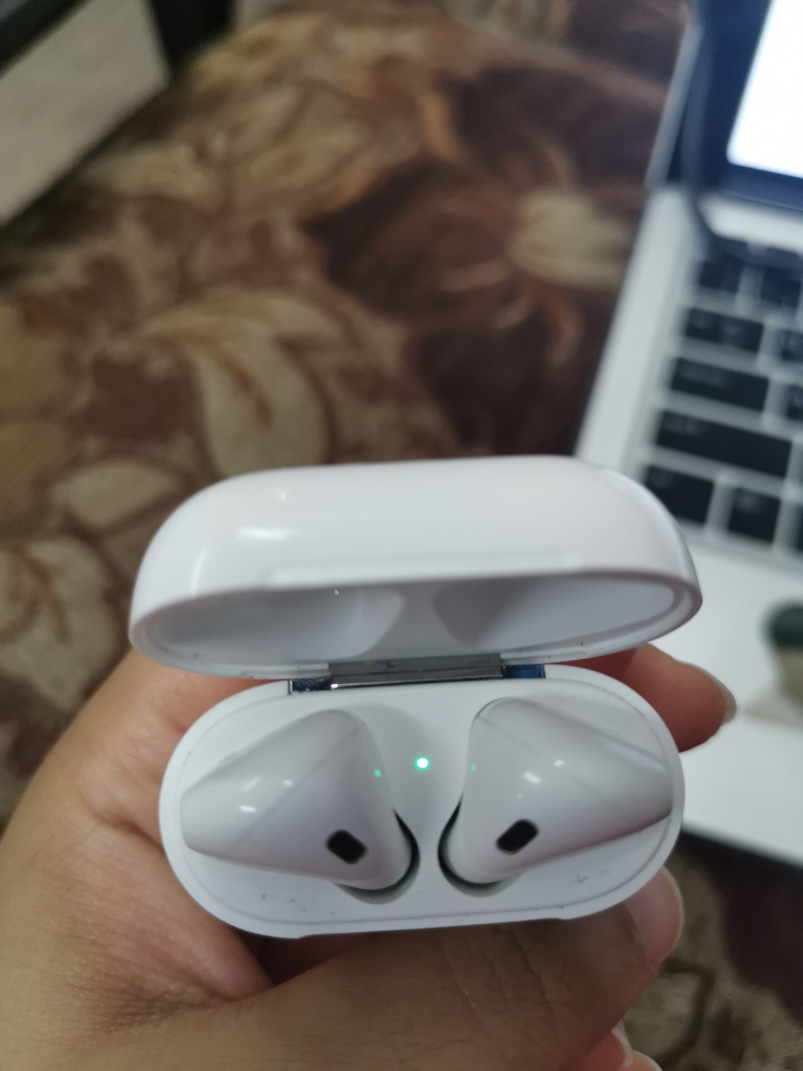 Airpods only solid white light. Apple Community