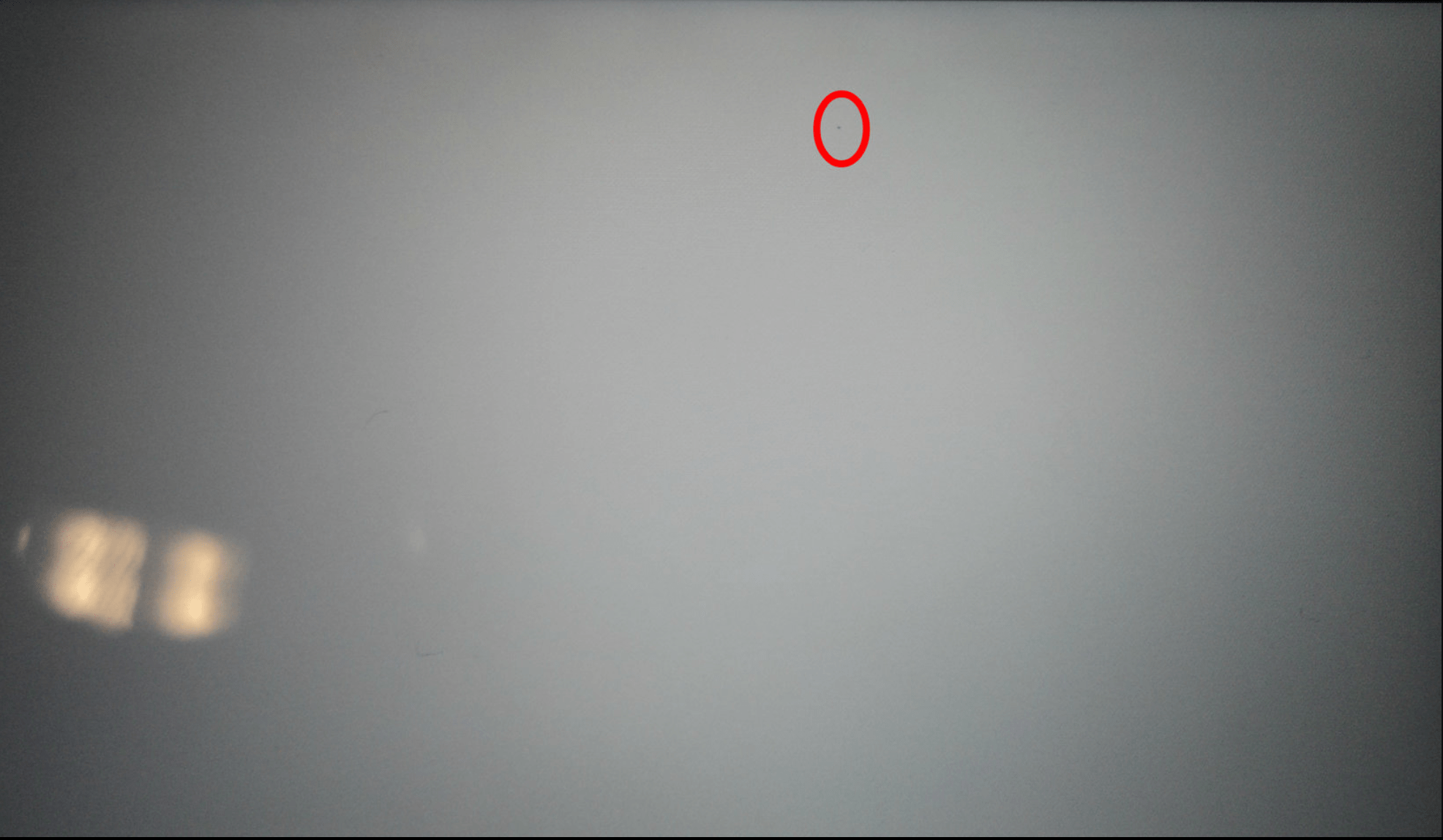 Small black dot on Iphone XS screen Apple Community