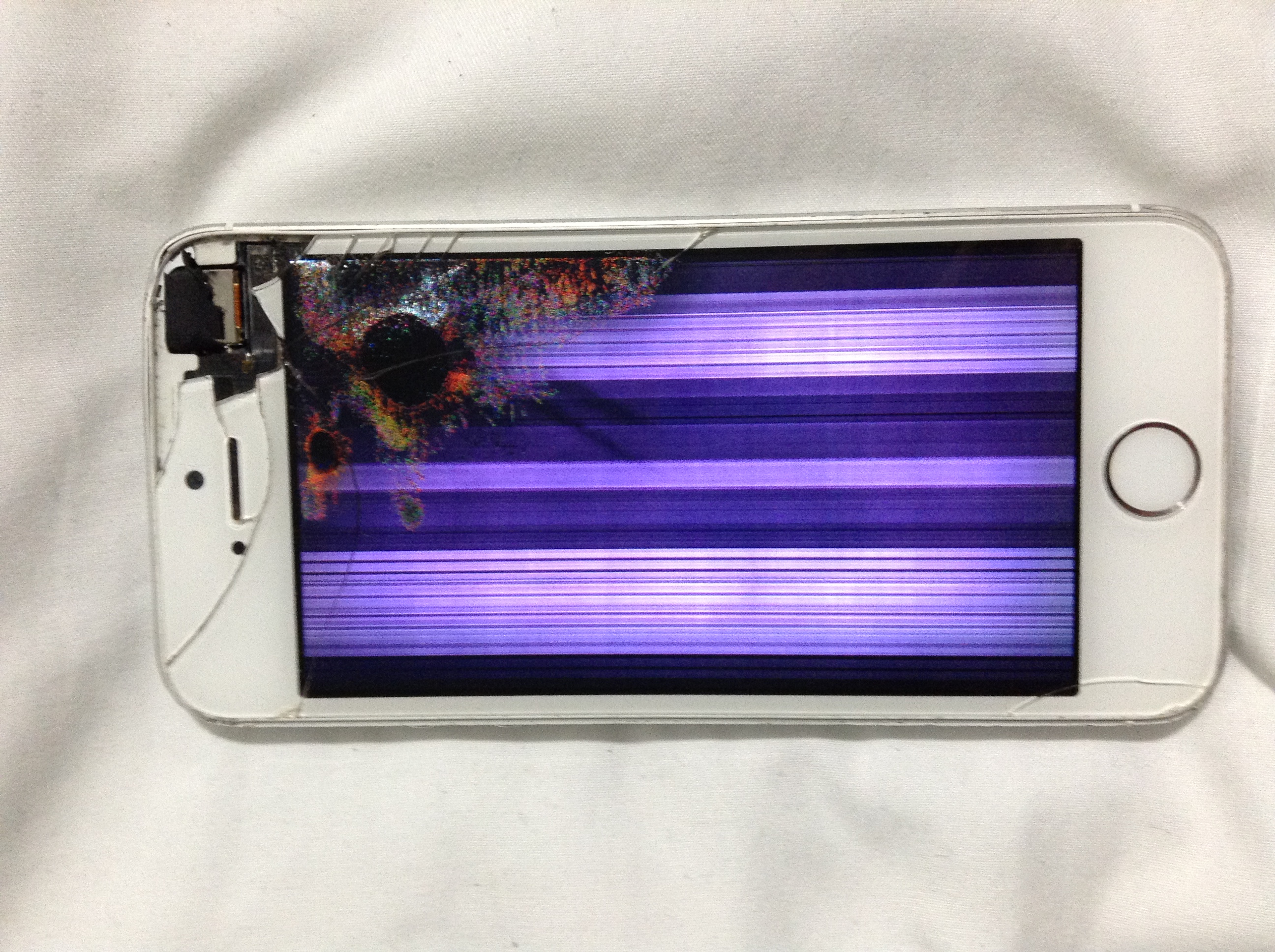 Black spots and vertical color changing l… Apple Community