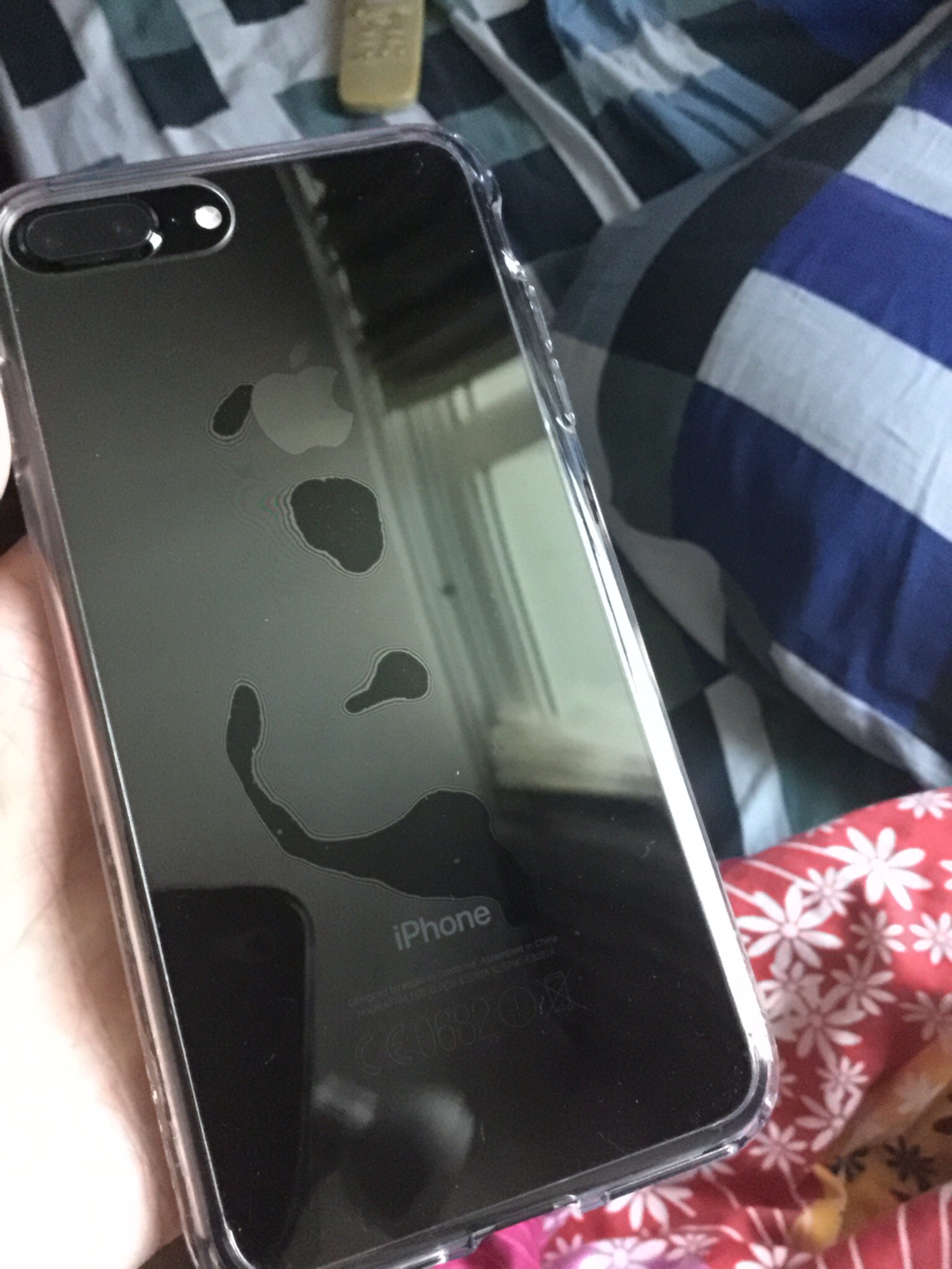 Jet black sticking to clear case Apple Community