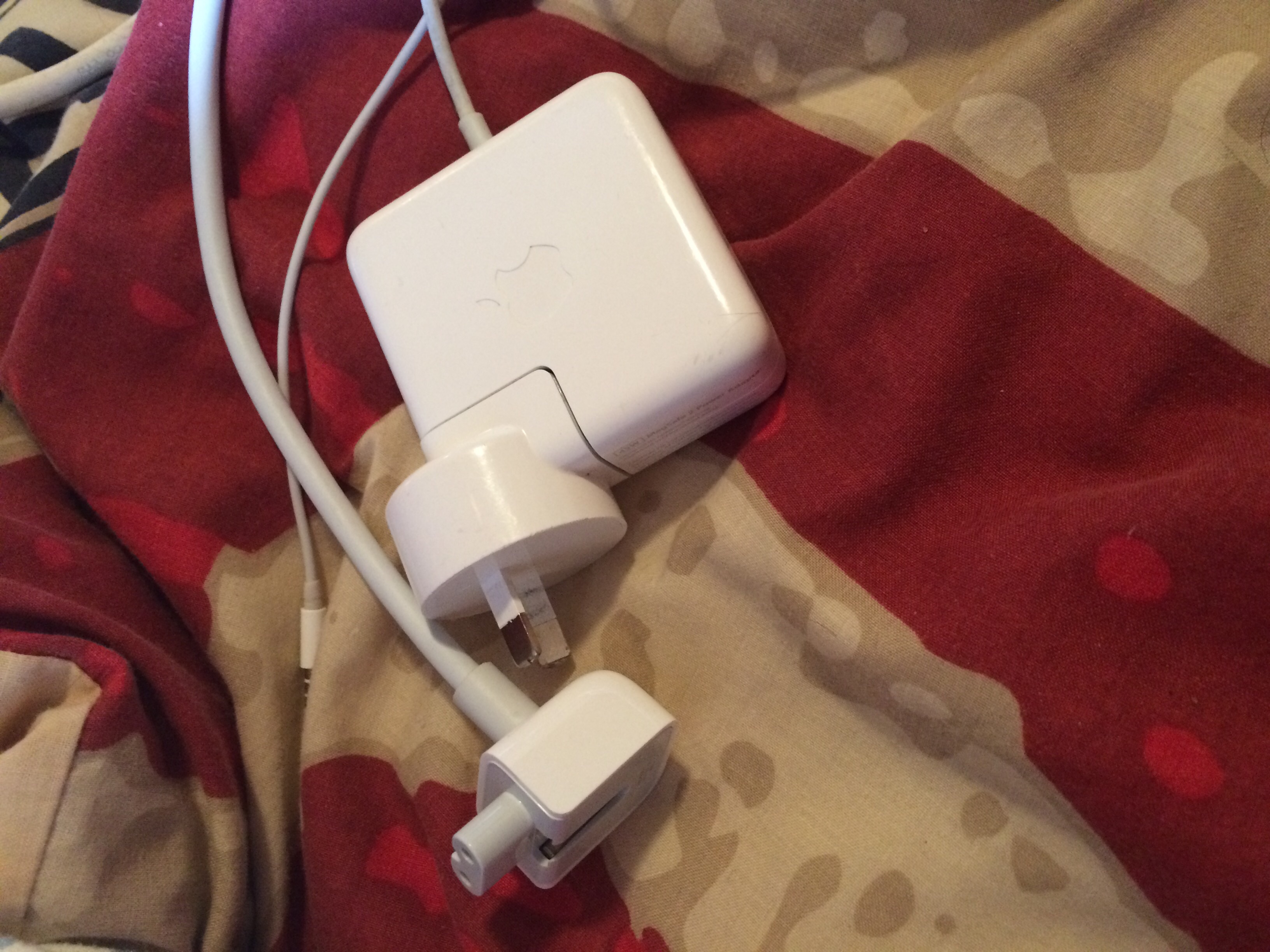 How do I remove the AC plug on my power a… Apple Community