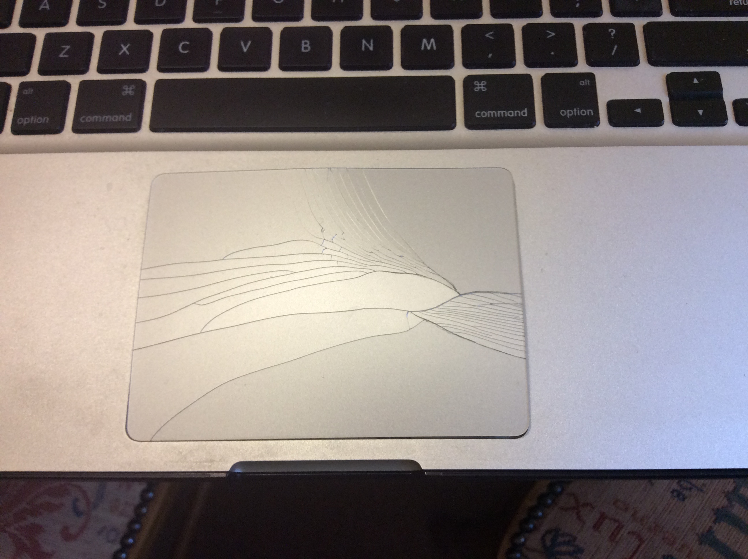Cracked MacBook touch pad Apple Community