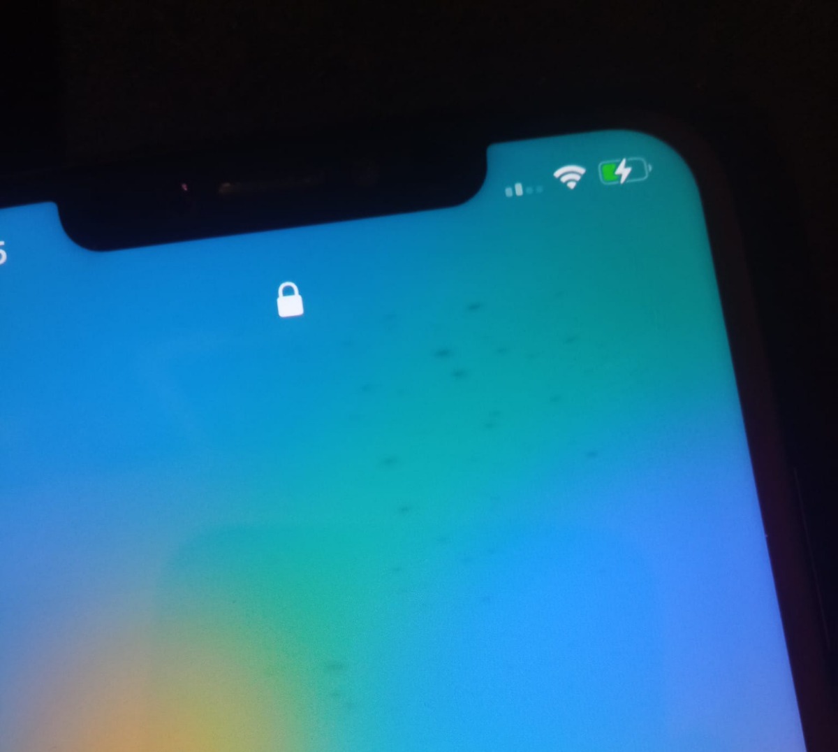 What are those black dots on the screen? Apple Community