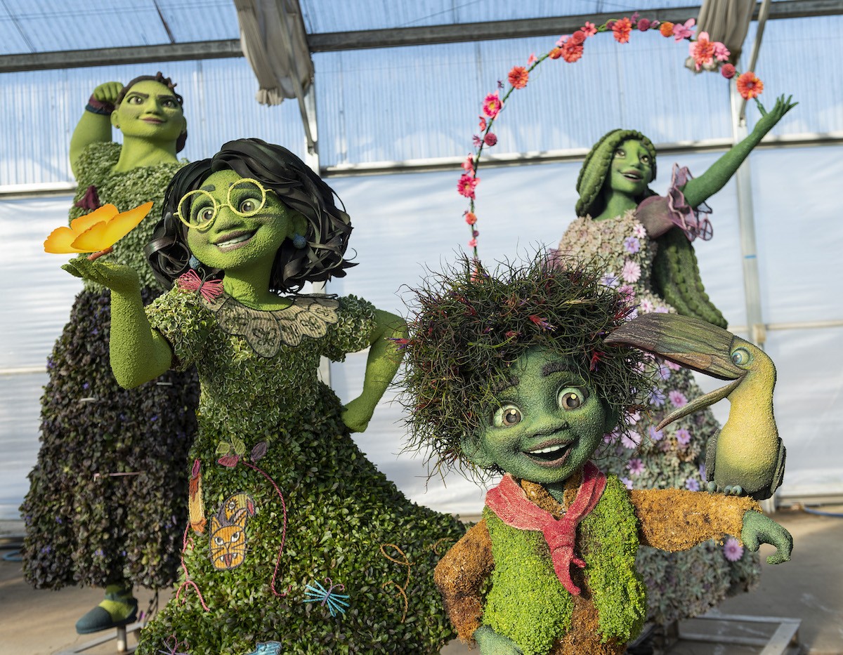 A behindthescenes look at the new Encanto, Tiana topiaries