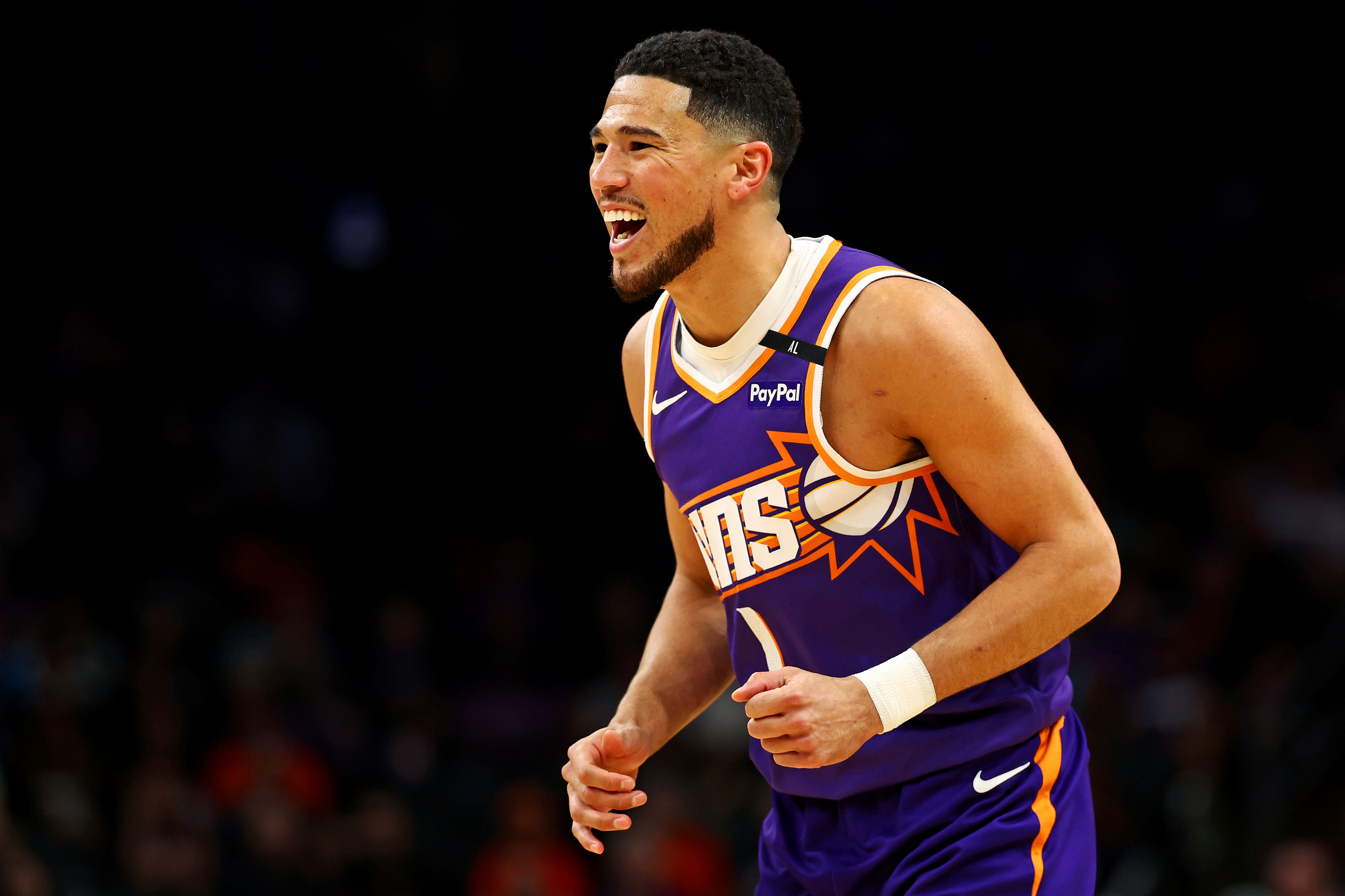 Devin Booker Leads Phoenix Suns to Fifth Consecutive Victory, Elevating
