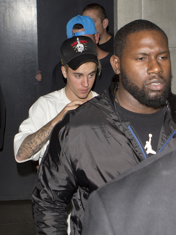 Dlisted Justin Bieber surrounded by Bodyguards was seen leaving