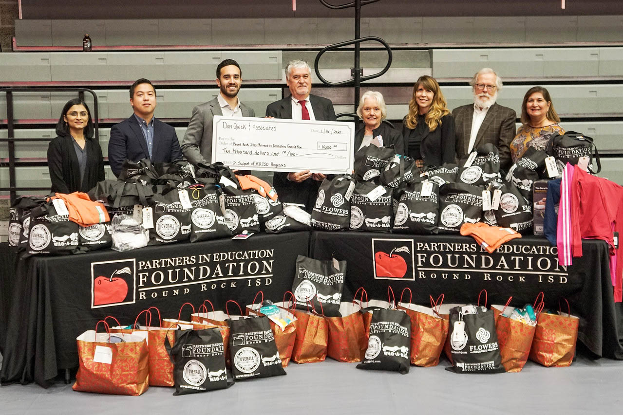 Don Quick & Associates, Inc. Donates 10,000 to RRISD Programs Don Quick & Associates, Inc