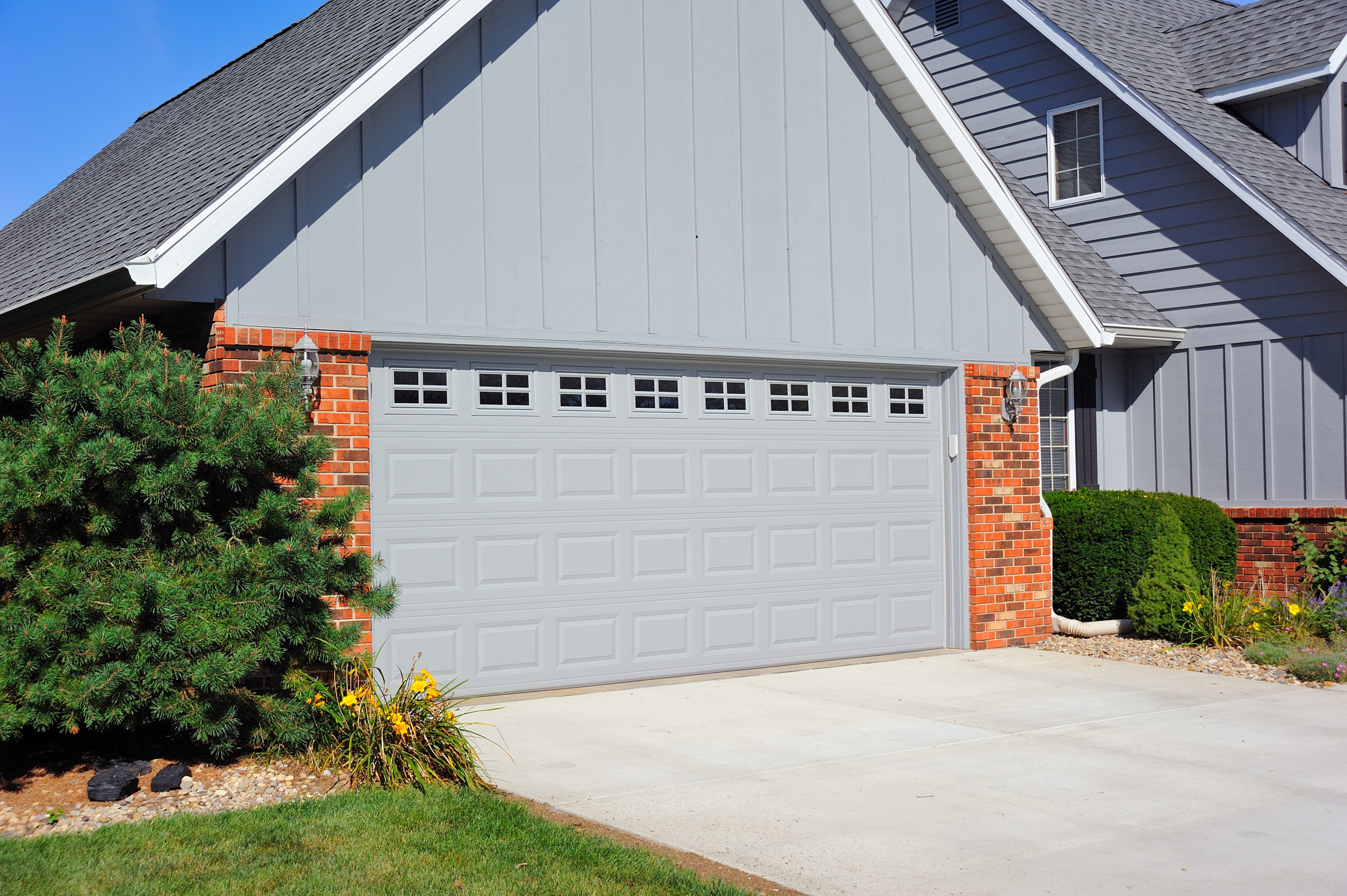 Residential Garage Door Service at the Door & Fence Store