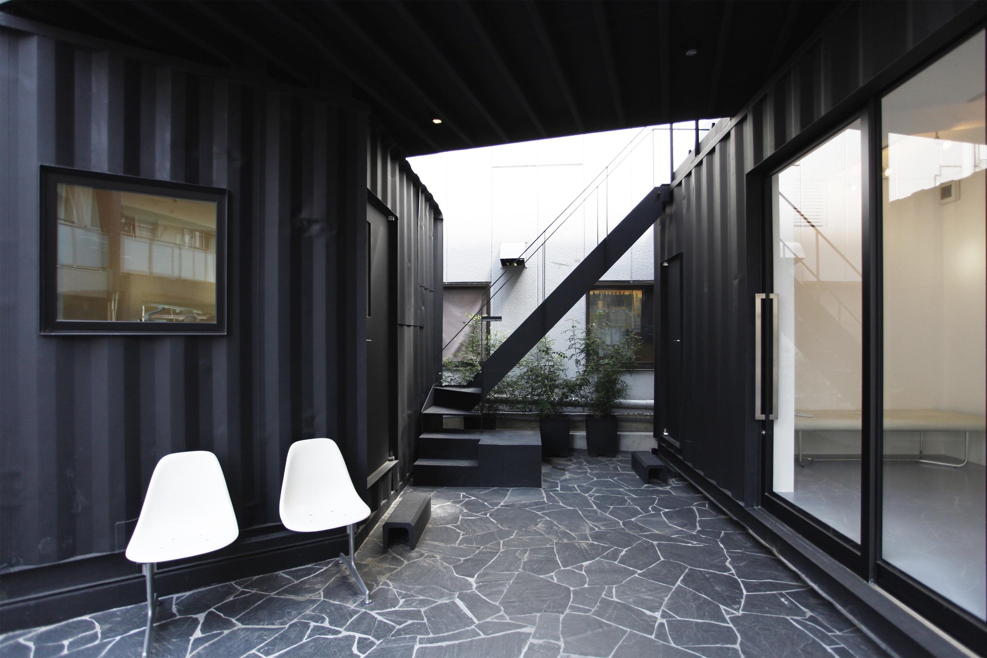 Tokyo Stack Two Shipping Containers Create Corner Office Designs