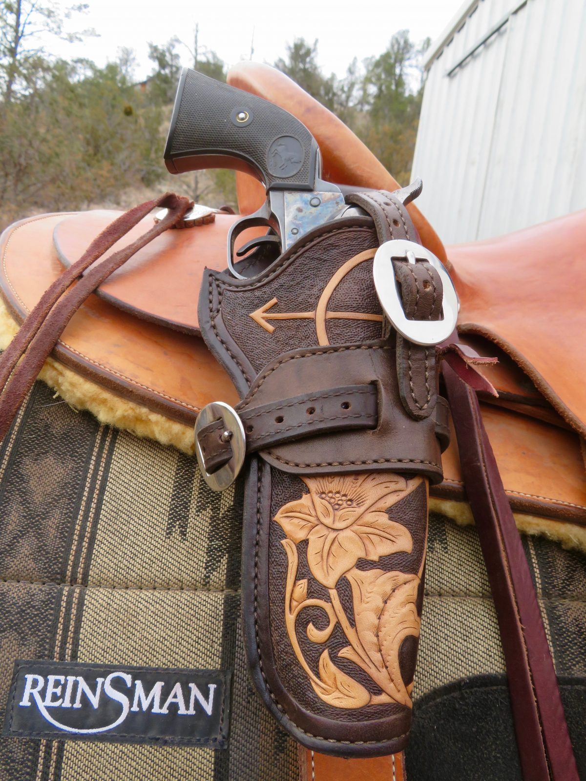 Custom Leather Pistol Holsters/Flank Cinch Holders and Rifle Scabbards